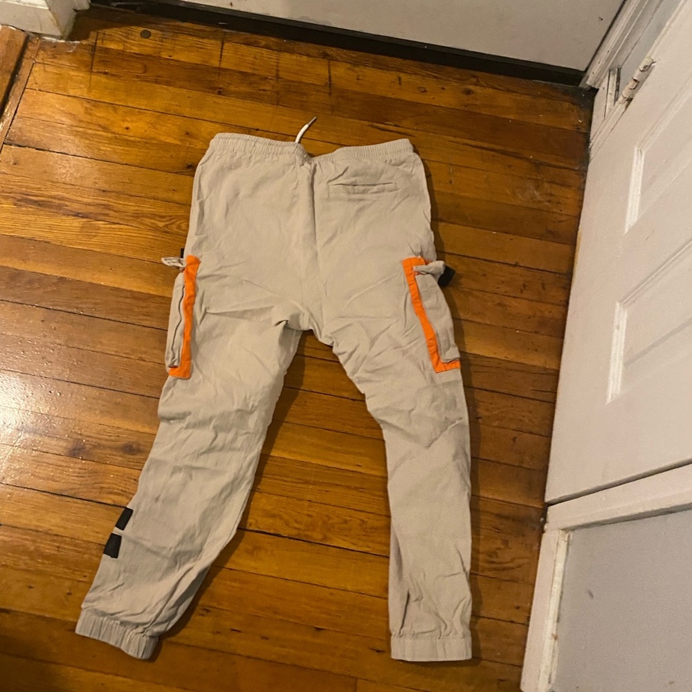 Beige and orange tech cargos